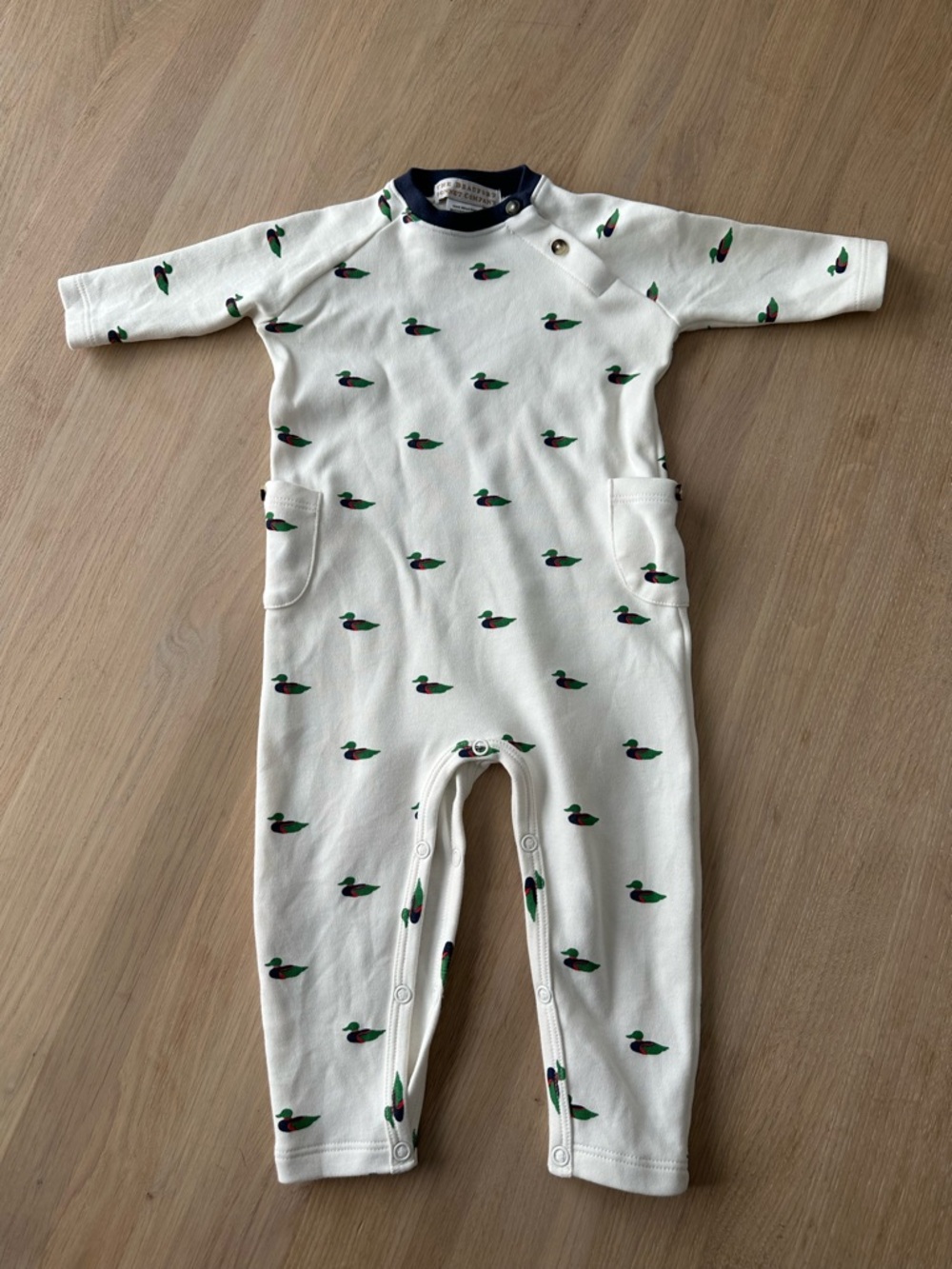 The Beaufort Bonnet Company Off-White One-Piece Romper with Green Duck Print
